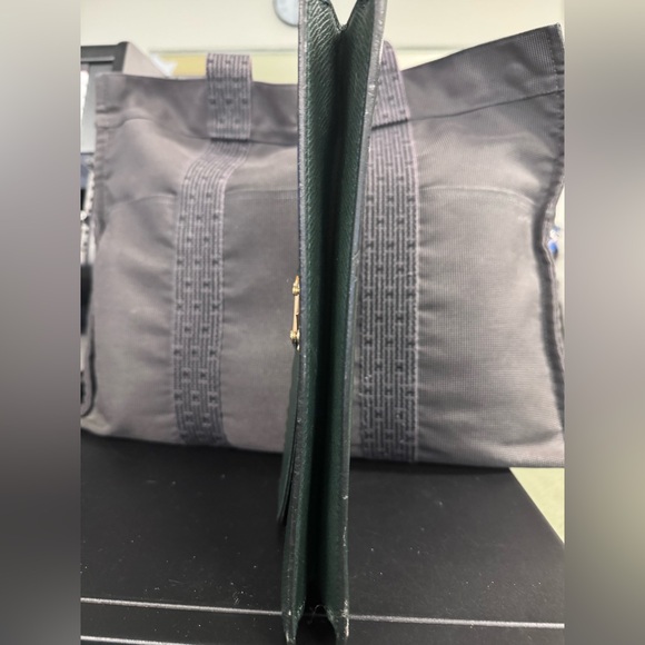 Louis Vuitton Tiaga Leather Clutch - Picture 4 of 12